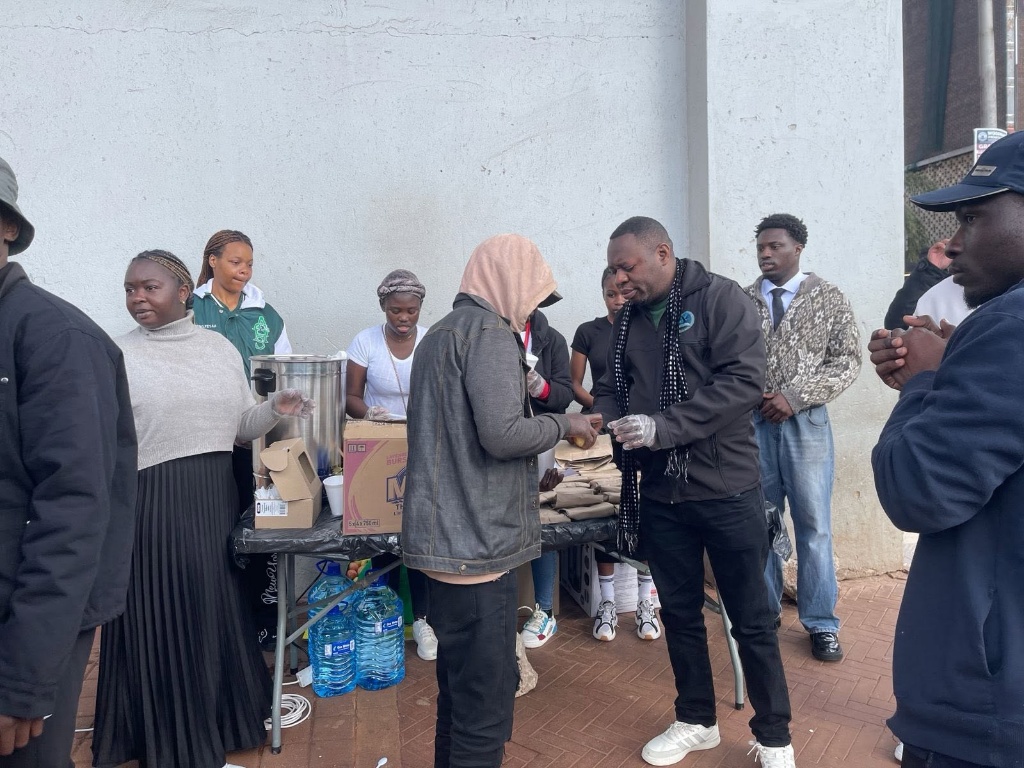Volunteers Serving Community Members
